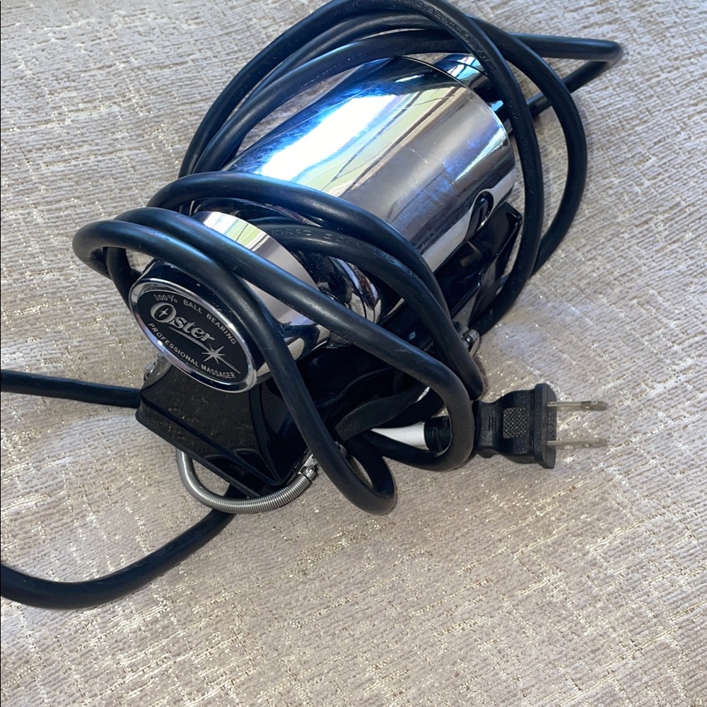 Oster Chrome and Black Handheld Massager